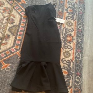 Likely one shoulder “Fina midi Dress” in black.